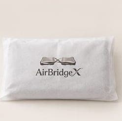 AirBridgeX 로고가 인쇄된 흰색 부직포백